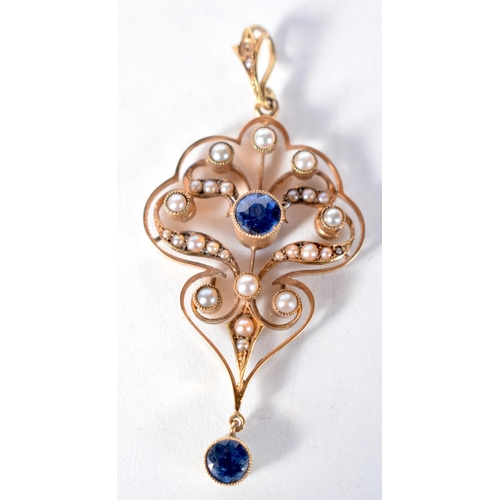 1596 - An Antique Gold (poss 15 Carat) Edwardian Pendant set with Pearls and Sapphires in a fitted case.  5... 