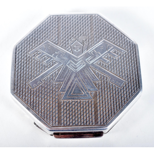 1598 - A Hexagonal Compact with Geometric Design.  6.3 cm x 1cm, weight 66.3g