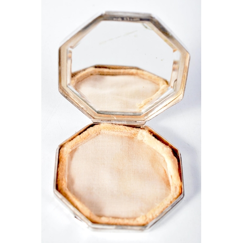 1598 - A Hexagonal Compact with Geometric Design.  6.3 cm x 1cm, weight 66.3g