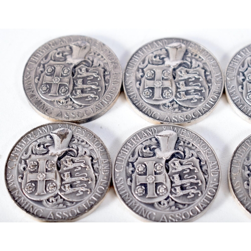 1599 - Fourteen Silver Swimming Medals.  Stamped Sterling.  3.2 cm diameter, total weight 273.5g (14)