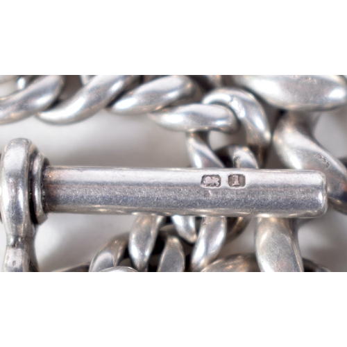 1600 - A Silver Watch Chain.  Stamped Silver.  33 cm long, weight 46.6g