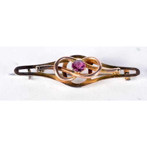 1609 - A 9 Carat Gold Bar Brooch set with an Amethyst.  Stamped 9CT.  4.4cm x 1.2 cm, weight 2.3g