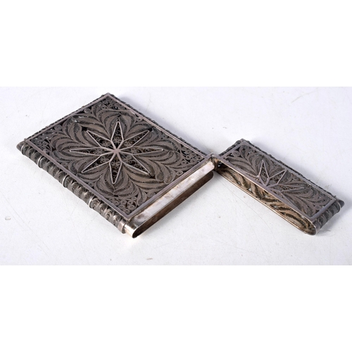 1614 - A Filigree Silver Card Case.  9.8 cm x 6.1cm x 1cm, weight 56.8g