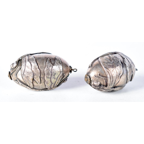 1615 - Two White Metal Egg Pendants.  4.5 cm x 2.6 cm, total weight 30.9g (2)