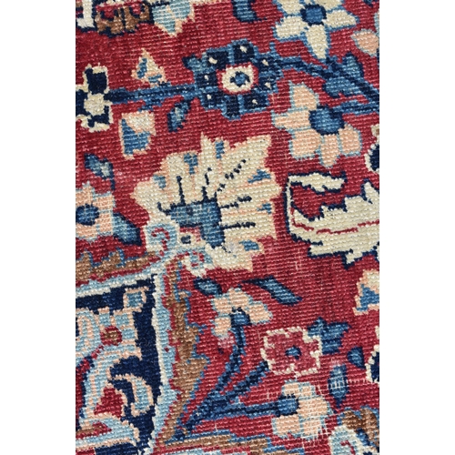 3993 - A Persian rug 189 x 122 cm