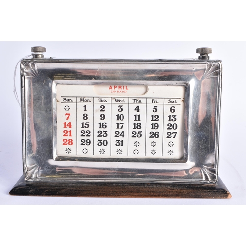 107 - AN ART DECO SILVER MOUNTED WOOD DESK STAND CALENDER. Birmingham 1930. 19 cm x 15 cm.
