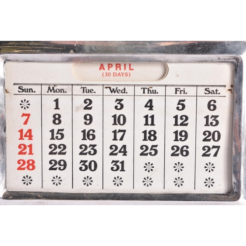 107 - AN ART DECO SILVER MOUNTED WOOD DESK STAND CALENDER. Birmingham 1930. 19 cm x 15 cm.