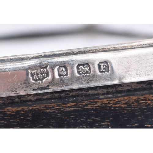 107 - AN ART DECO SILVER MOUNTED WOOD DESK STAND CALENDER. Birmingham 1930. 19 cm x 15 cm.