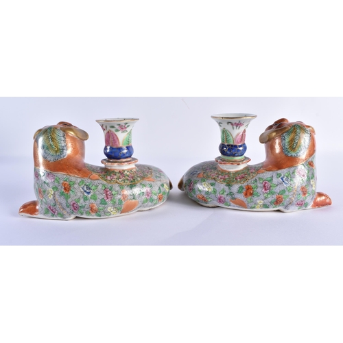 114 - A PAIR OF EARLY 19TH CENTURY CHINESE CANTON FAMILLE ROSE JOSS STICK HOLDERS Qing, modelled as coral ... 