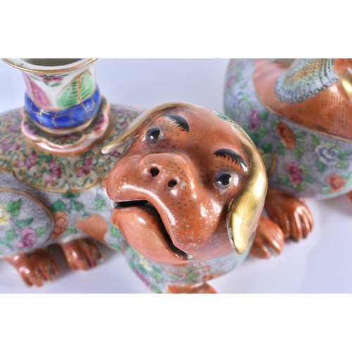 114 - A PAIR OF EARLY 19TH CENTURY CHINESE CANTON FAMILLE ROSE JOSS STICK HOLDERS Qing, modelled as coral ... 