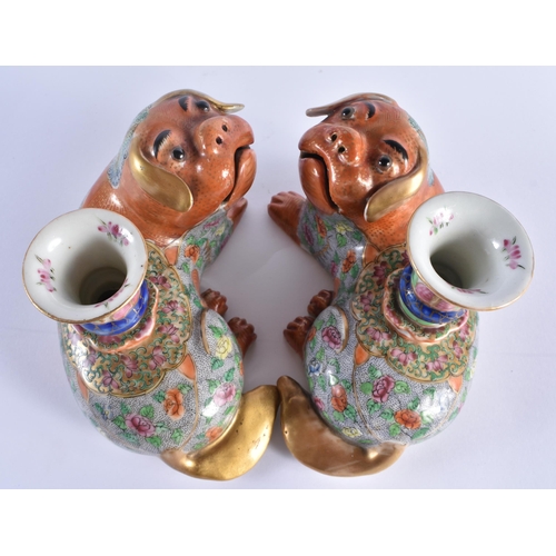 114 - A PAIR OF EARLY 19TH CENTURY CHINESE CANTON FAMILLE ROSE JOSS STICK HOLDERS Qing, modelled as coral ... 