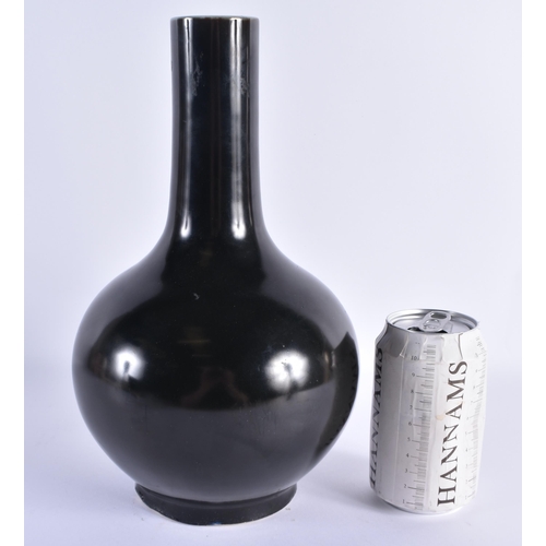 116 - A LARGE CHINESE QING DYNASTY BLACK MONOCHROME PORCELAIN BULBOUS VASE bearing Kangxi marks to base. 2... 