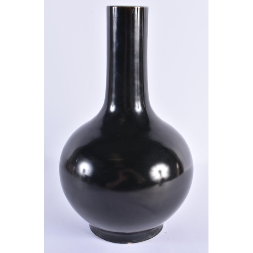 116 - A LARGE CHINESE QING DYNASTY BLACK MONOCHROME PORCELAIN BULBOUS VASE bearing Kangxi marks to base. 2... 