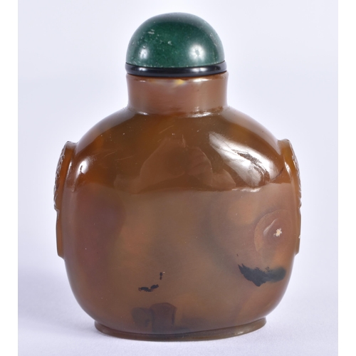 120 - A 19TH CENTURY CHINESE CARVED AGATE SNUFF BOTTLE Qing, with jade stopper. 7.5 cm x 5.5 cm.