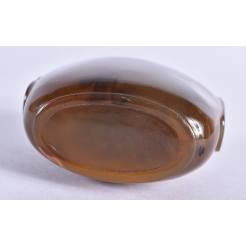 120 - A 19TH CENTURY CHINESE CARVED AGATE SNUFF BOTTLE Qing, with jade stopper. 7.5 cm x 5.5 cm.