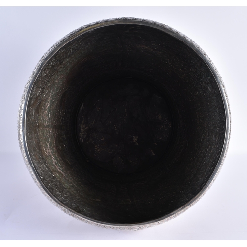 125 - A VERY LARGE LATE 19TH CENTURY INDIAN WHITE METAL JARDINIERE decorative with animals and palm trees,... 