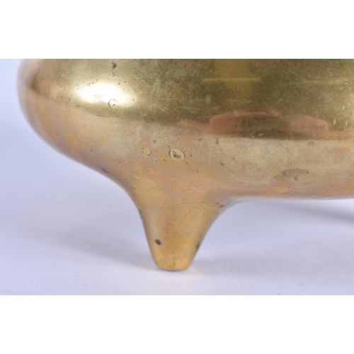 127 - AN 18TH CENTURY CHINESE TWIN HANDLED BRONZE CENSER with high loop handles, bearing Xuande marks to b... 