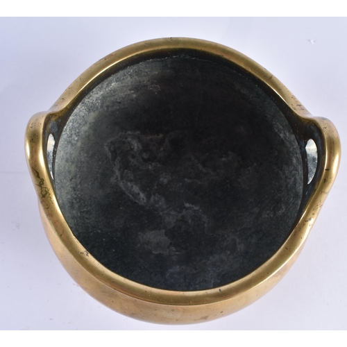 127 - AN 18TH CENTURY CHINESE TWIN HANDLED BRONZE CENSER with high loop handles, bearing Xuande marks to b... 