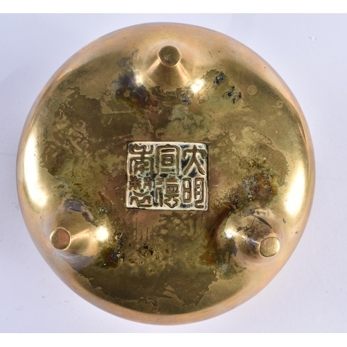 127 - AN 18TH CENTURY CHINESE TWIN HANDLED BRONZE CENSER with high loop handles, bearing Xuande marks to b... 