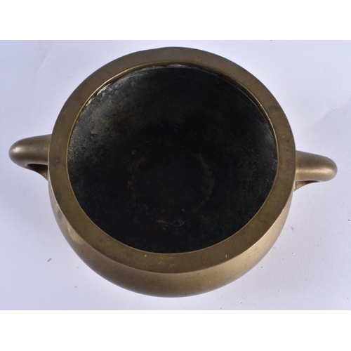 128 - A GOOD 18TH CENTURY CHINESE TWIN HANDLED BRONZE CENSER bearing unusual four character studio marks t... 