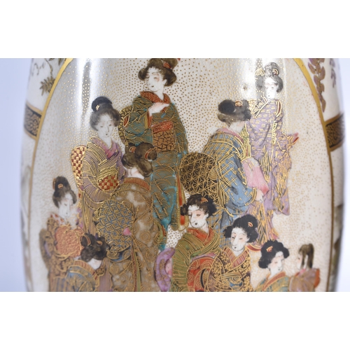 134 - A PAIR OF LATE 19TH CENTURY JAPANESE MEIJI PERIOD SATSUMA POTTERY VASES painted with a group of geis... 