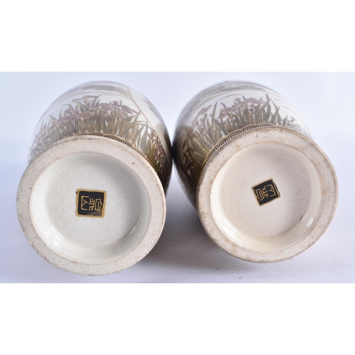 134 - A PAIR OF LATE 19TH CENTURY JAPANESE MEIJI PERIOD SATSUMA POTTERY VASES painted with a group of geis... 