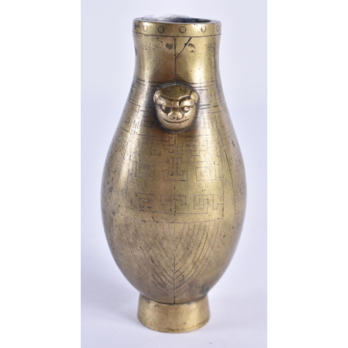 145 - AN UNUSUAL 18TH/19TH CENTURY CHINESE BRONZE TWIN HANDLED VASE Late Qianlong/Jiaqing, inlaid with geo... 