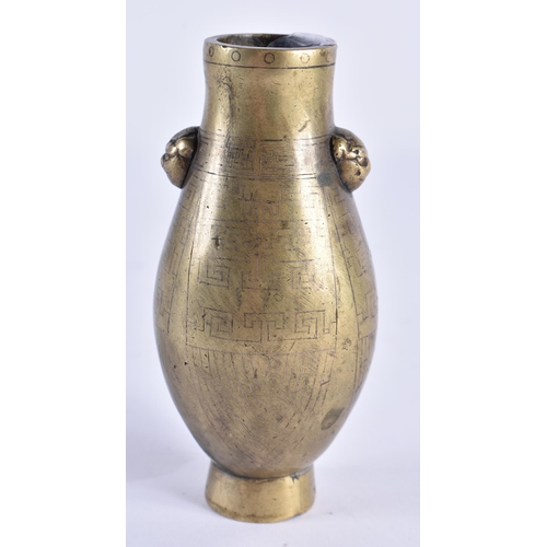 145 - AN UNUSUAL 18TH/19TH CENTURY CHINESE BRONZE TWIN HANDLED VASE Late Qianlong/Jiaqing, inlaid with geo... 