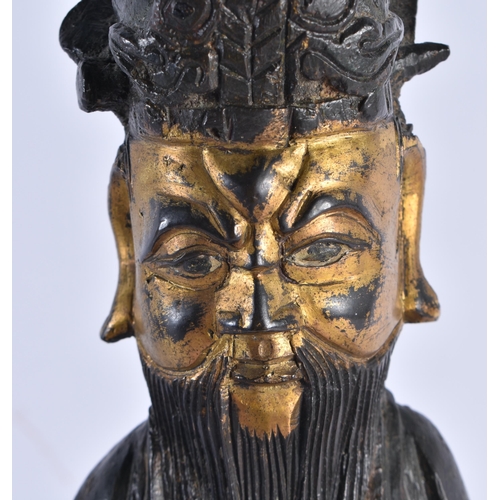 147 - A LARGE 16TH/17TH CENTURY CHINESE PARTIAL GILT BRONZE FIGURE OF AN IMMORTAL Late Ming, modelled upon... 