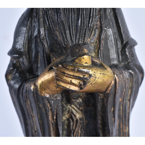 147 - A LARGE 16TH/17TH CENTURY CHINESE PARTIAL GILT BRONZE FIGURE OF AN IMMORTAL Late Ming, modelled upon... 