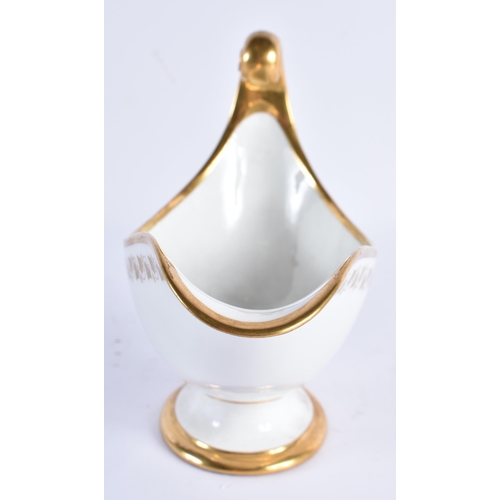 157 - A LATE 19TH CENTURY FRENCH SEVRES PORCELAIN SAUCE BOAT painted with gilded flowers and trailing vine... 