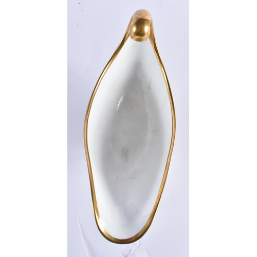 157 - A LATE 19TH CENTURY FRENCH SEVRES PORCELAIN SAUCE BOAT painted with gilded flowers and trailing vine... 