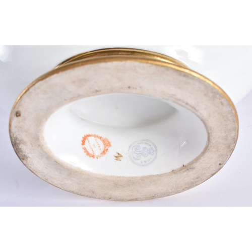 157 - A LATE 19TH CENTURY FRENCH SEVRES PORCELAIN SAUCE BOAT painted with gilded flowers and trailing vine... 