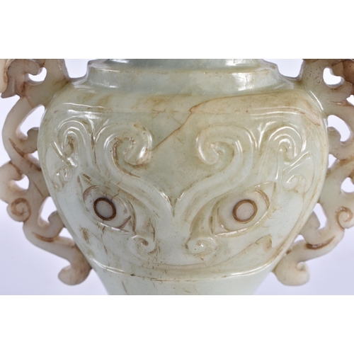 163 - AN EARLY 20TH CENTURY CHINESE CARVED TWIN HANDLED JADE VASE AND COVER Late Qing/Republic. 19 cm x 10... 