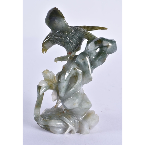 165 - AN EARLY 20TH CENTURY CHINESE CARVED JADEITE FIGURE OF AN EAGLE Late Qing/Republic. 12 cm x 6 cm.