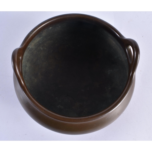 167 - A RARE CHINESE QING DYNASTY TWIN HANDLED BRONZE CENSER bearing unusual studio mark to base. 2378 gra... 
