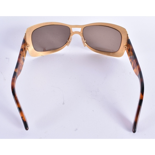 62 - A CASED PAIR OF GUCCI SUNGLASSES. 15 cm wide.