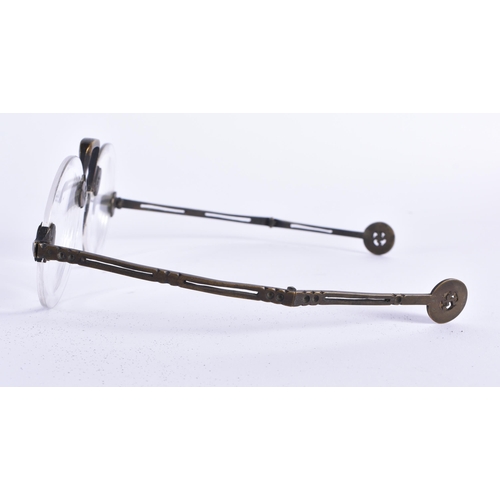 65 - A RARE PAIR OF CHINESE QING DYNASTY BRONZE SPECTACLES. 15 cm wide.
