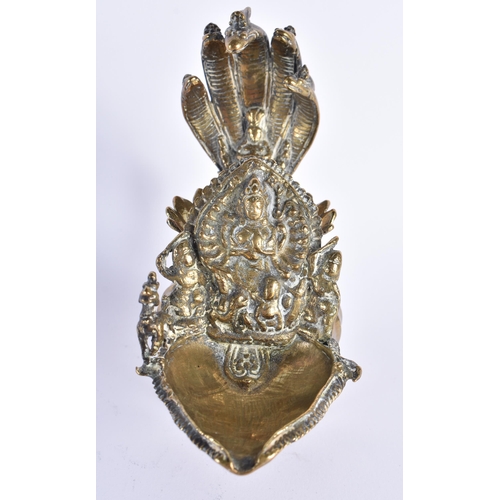68 - AN ANTIQUE INDIAN BRONZE HINDO DEITY VESSEL. 15 cm high.