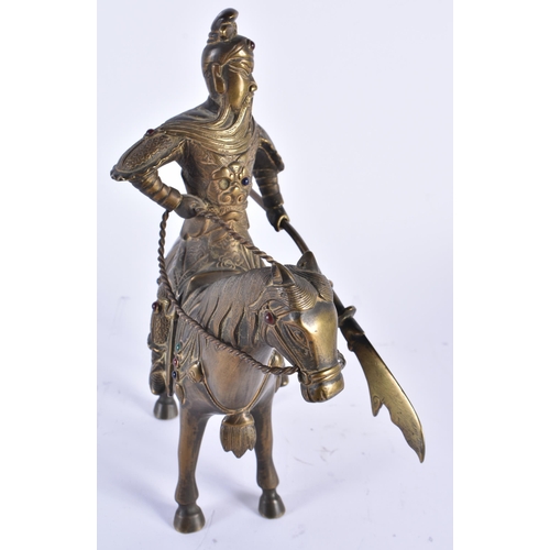 69 - A CHINESE QING DYNASTY BRONZE FIGURE OF A WARRIOR ON HORSEBACK inset with gems, embellished in motif... 