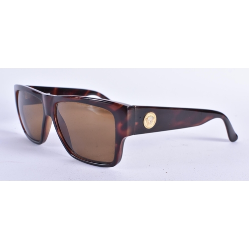 73 - A PAIR OF VERSACE SUNGLASSES. 15 cm wide.
