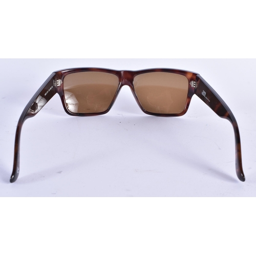 73 - A PAIR OF VERSACE SUNGLASSES. 15 cm wide.