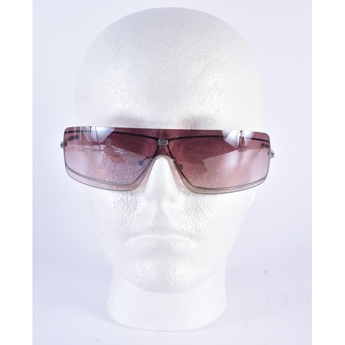 74 - A PAIR OF GUCCI SUNGLASSES. 15 cm wide.