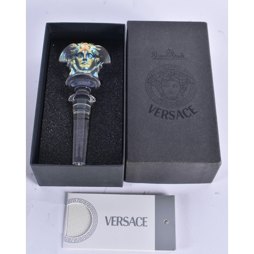 75 - A VERSACE ROSENTHAL IRIDESCENT GLASS BOTTLE STOPPER. 14 cm long.