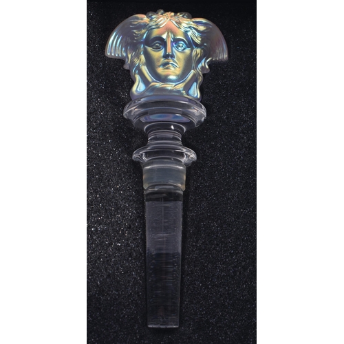 75 - A VERSACE ROSENTHAL IRIDESCENT GLASS BOTTLE STOPPER. 14 cm long.