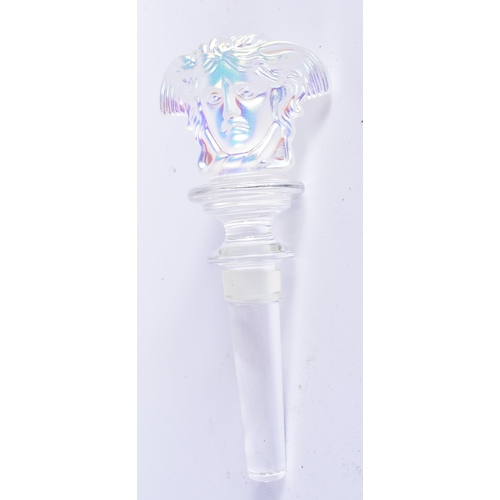 75 - A VERSACE ROSENTHAL IRIDESCENT GLASS BOTTLE STOPPER. 14 cm long.
