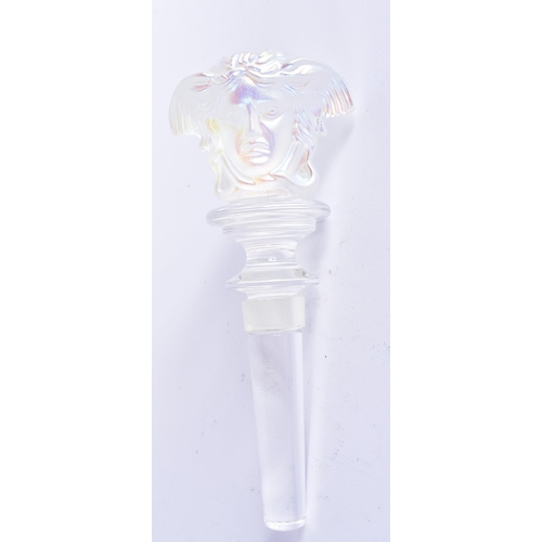 75 - A VERSACE ROSENTHAL IRIDESCENT GLASS BOTTLE STOPPER. 14 cm long.
