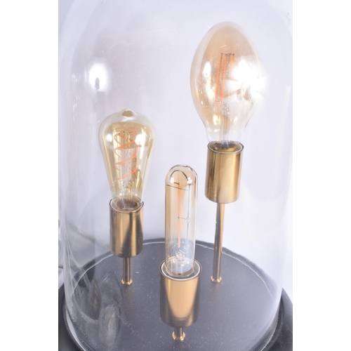 82 - A PAIR OF CONTEMPORARY TRIPLE BULB GLASS LAMPS. 45 cm x 20 cm.