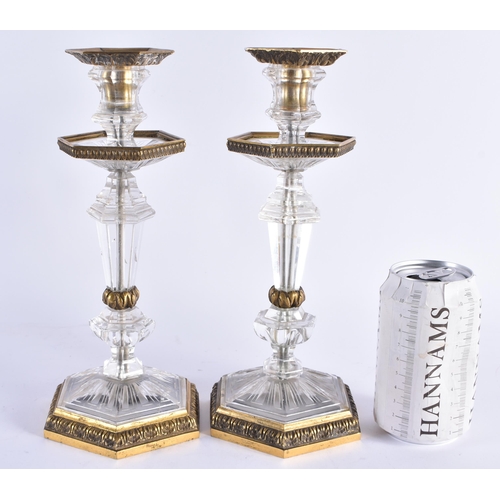 84 - A FINE PAIR OF EARLY 19TH CENTURY CONTINENTAL BRONZE AND ROCK CRYSTAL CANDLESTICKS French of Russian... 