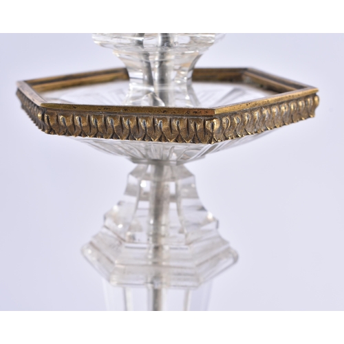 84 - A FINE PAIR OF EARLY 19TH CENTURY CONTINENTAL BRONZE AND ROCK CRYSTAL CANDLESTICKS French of Russian... 